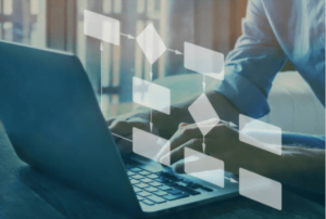 a man trying to draw a flowchart on laptop